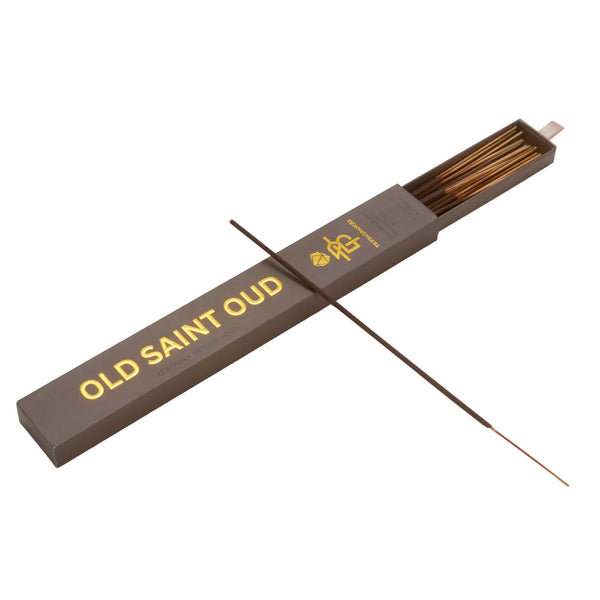 Incense stick set with 'Old Saint Oud' branding on a beige background