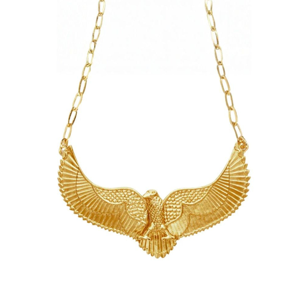 Gold necklace with an eagle pendant on a white background