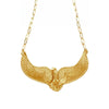 Gold necklace with an eagle pendant on a white background