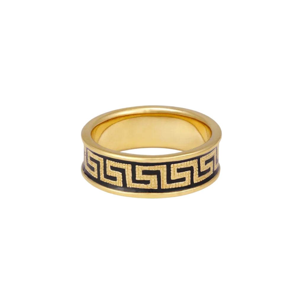 Gold ring with black geometric pattern on a white background