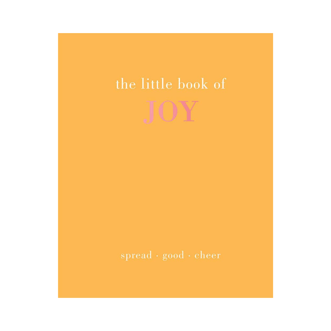 A minimalist book cover design with a solid orange-yellow background and the text 'the little book of JOY' in white and pink, with 'spread good cheer' at the bottom.