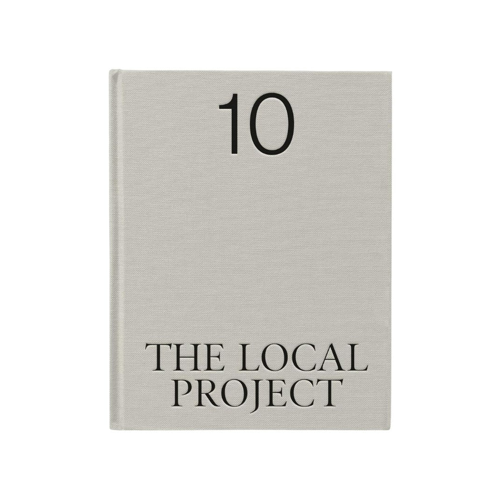 Book titled 'The Local Project' with number 10 on a light gray cover