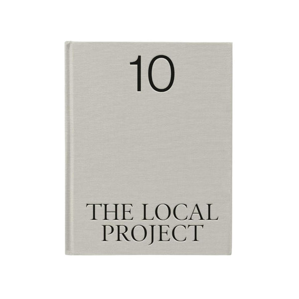 Book titled 'The Local Project' with number 10 on a light gray cover