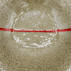 stoneware plate with red line texture
