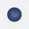 Blue ceramic bowl on a white background
