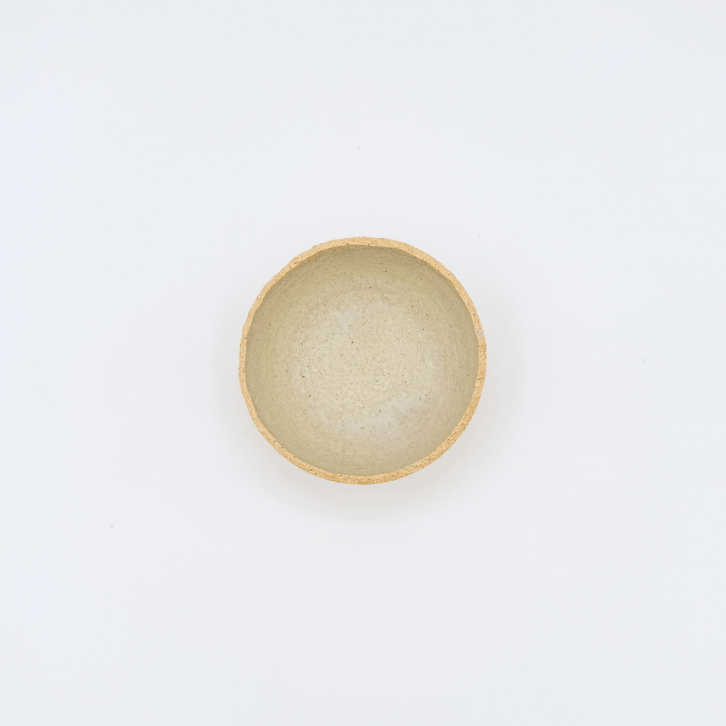Small ceramic bowl on a white background