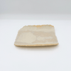 Rectangular piece of stone or ceramic on a white background