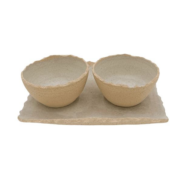 Two ceramic bowls on a matching tray with a white background