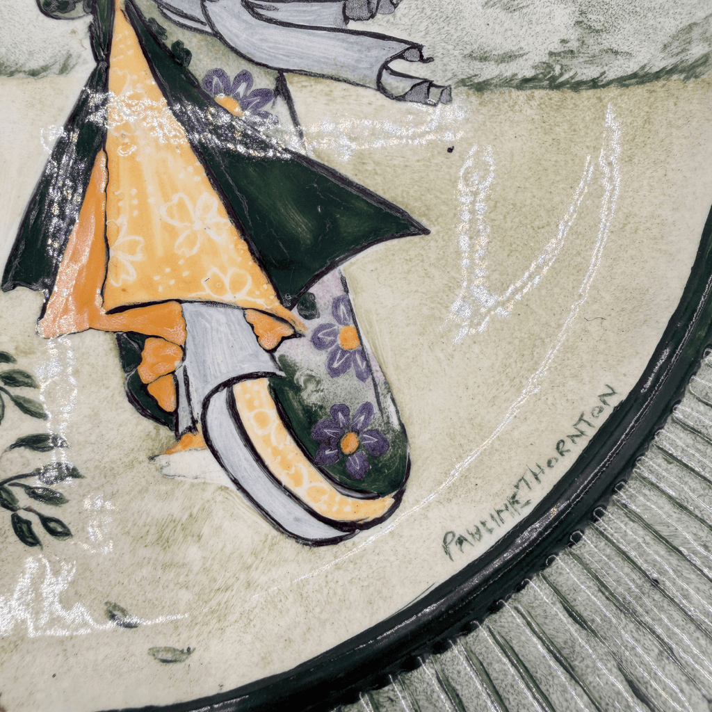 Decorative plate with a signature