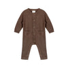 Brown baby knitted romper with buttons on a white background