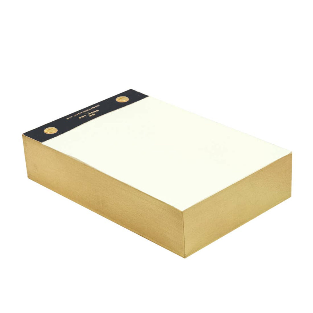 A gold-colored rectangular box with a cream-colored top surface and a black header band along one edge, photographed on a plain white background.
