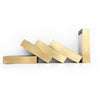 Four slim hardcover books arranged in a stylized leaning stack on a clean white background.