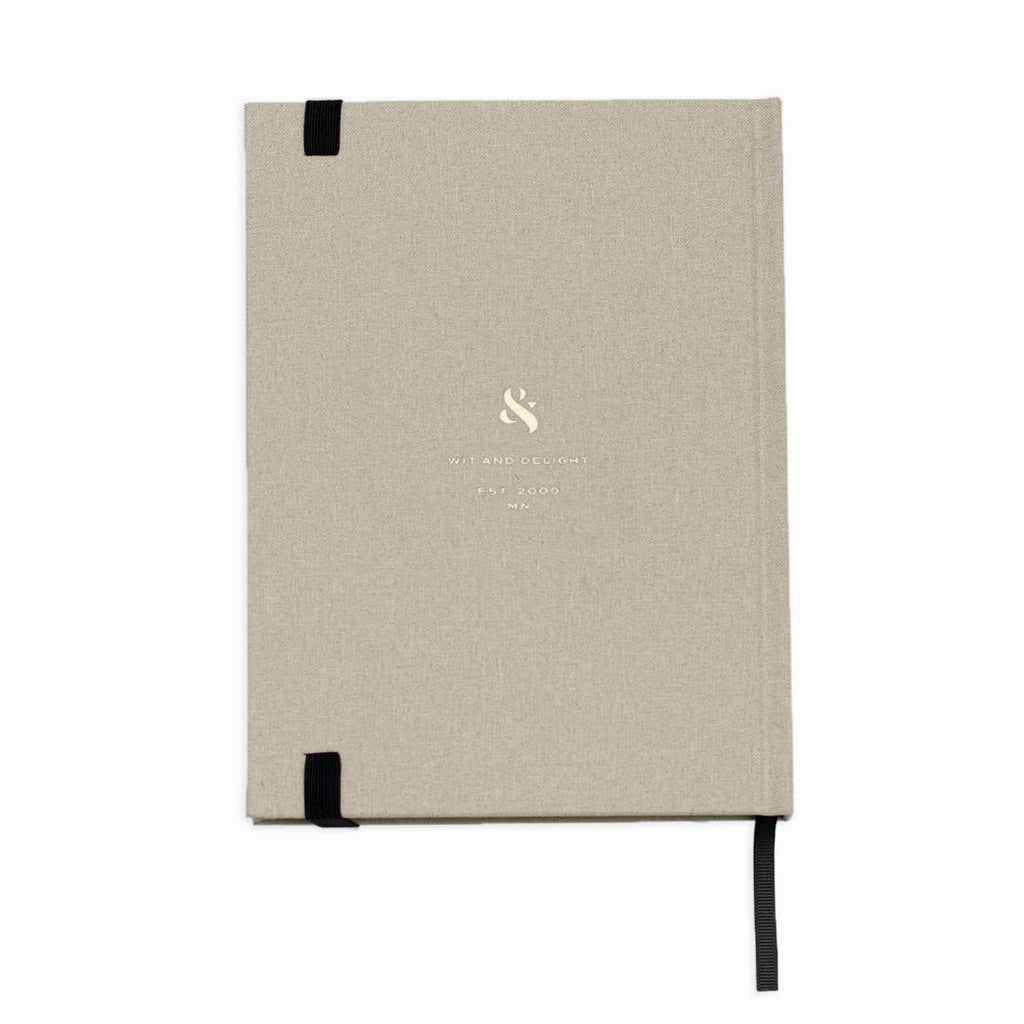 Beige notebook with black accents and a logo on a white background