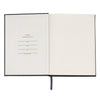 Open notebook with a blank page on a white background