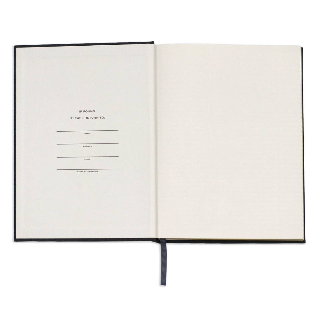 Open notebook with a blank page on a white background