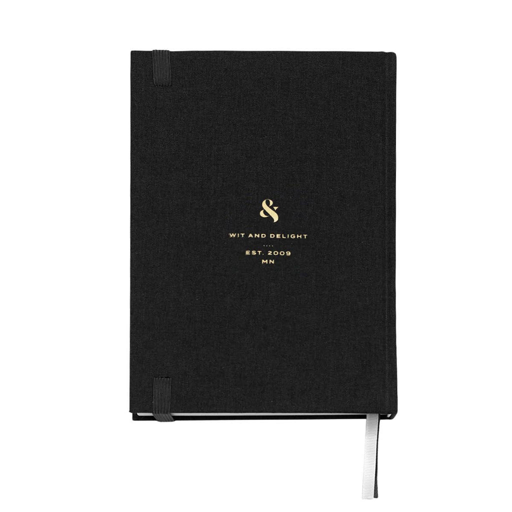 Black notebook with gold logo and text on a white background