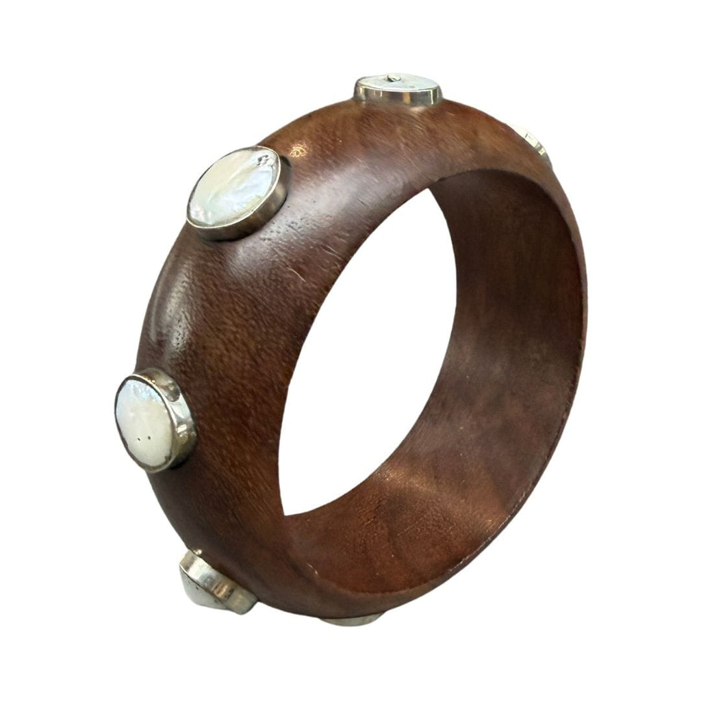 Wooden bracelet with silver accents on a white background