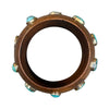 Wooden ring with turquoise stones on a white background