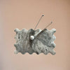 Decorative wall clock with marble-like design on a gradient background